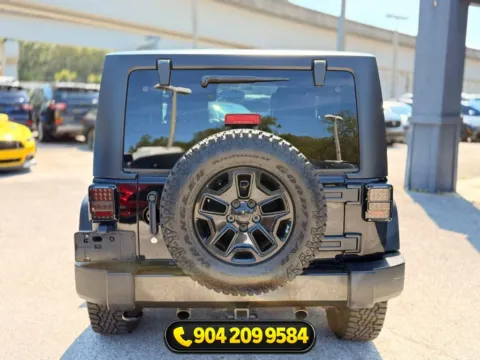 More photos of 2014 Jeep Wrangler Willys Wheeler at AUTOLAND, FL