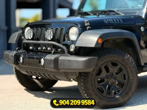 Another view of 2014 Jeep Wrangler Willys Wheeler for sale in Jacksonville, FL at AUTOLAND