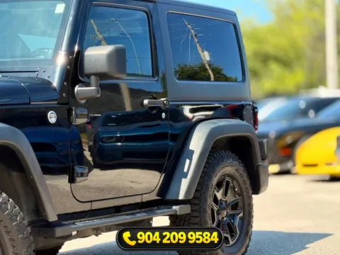 More photos of 2014 Jeep Wrangler Willys Wheeler at AUTOLAND, FL