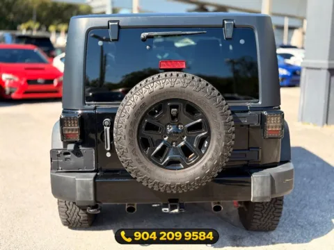 More photos of 2014 Jeep Wrangler Willys Wheeler at AUTOLAND, FL