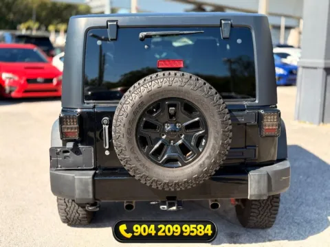 More photos of 2014 Jeep Wrangler Willys Wheeler at AUTOLAND, FL