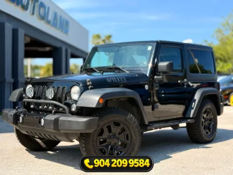 Black 2014 Jeep Wrangler Willys Wheeler for sale in Jacksonville, FL