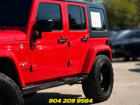 More photos of 2018 Jeep Wrangler JK Unlimited Sahara at AUTOLAND, FL