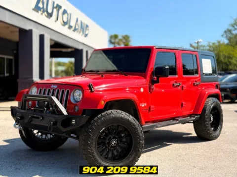 Red 2018 Jeep Wrangler JK Unlimited Sahara for sale in Jacksonville, FL
