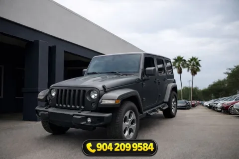 Gray 2017 Jeep Wrangler Unlimited Sahara for sale in Jacksonville, FL