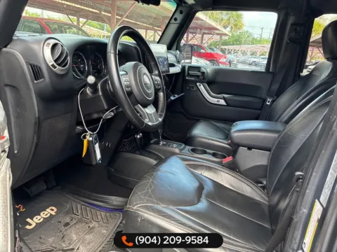 Another view of 2017 Jeep Wrangler Unlimited Sahara for sale in Jacksonville, FL at AUTOLAND