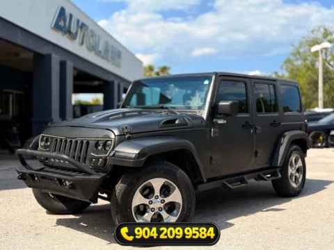 Gray 2017 Jeep Wrangler Unlimited Sahara for sale in Jacksonville, FL