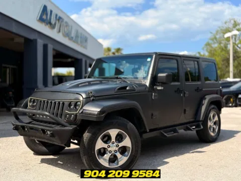 Gray 2017 Jeep Wrangler Unlimited Sahara for sale in Jacksonville, FL