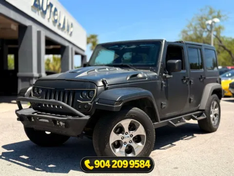 Gray 2017 Jeep Wrangler Unlimited Sahara for sale in Jacksonville, FL