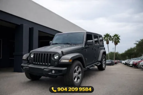 Gray 2017 Jeep Wrangler Unlimited Sahara for sale in Jacksonville, FL