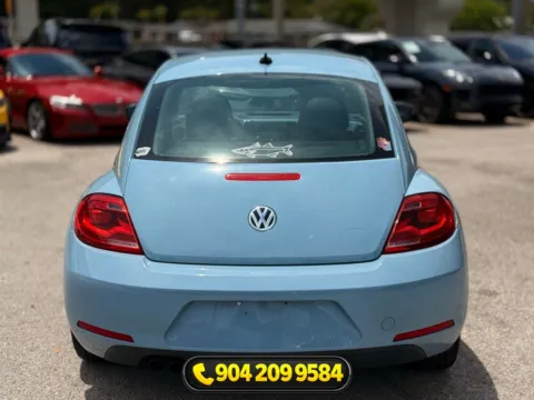 More photos of 2014 Volkswagen Beetle 2.5L at AUTOLAND, FL