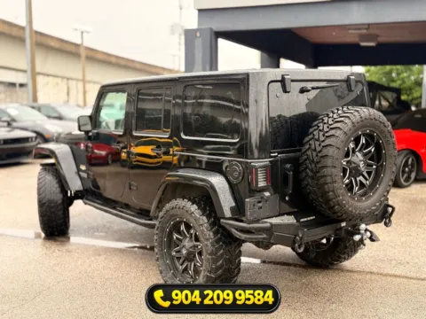 More photos of 2015 Jeep Wrangler Unlimited Sahara at AUTOLAND, FL