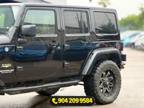 Another view of 2015 Jeep Wrangler Unlimited Sahara for sale in Jacksonville, FL at AUTOLAND