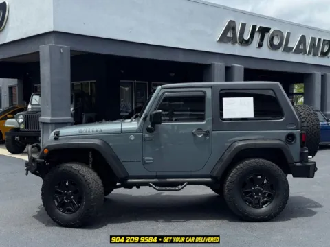 More photos of 2015 Jeep Wrangler Sport at AUTOLAND, FL