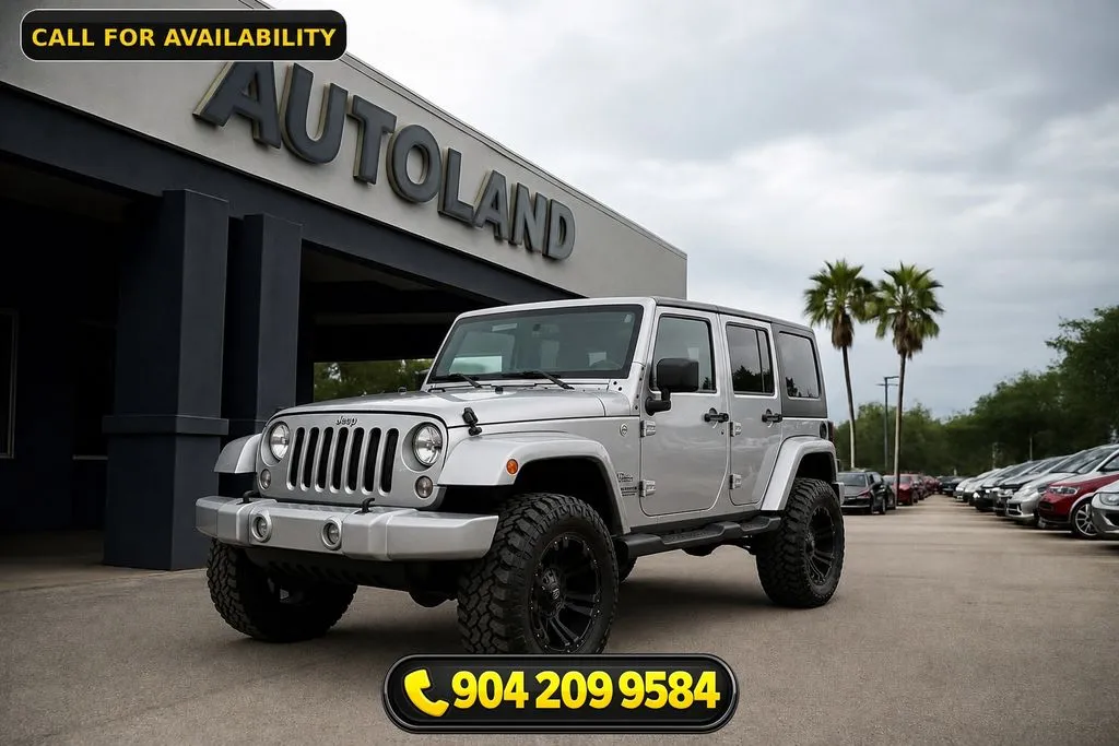 Silver 2014 Jeep Wrangler Unlimited Freedom Edition for sale in Jacksonville, FL