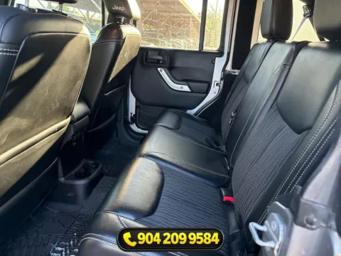 Photos of 2014 Jeep Wrangler Unlimited Freedom Edition for sale in Jacksonville, FL at AUTOLAND