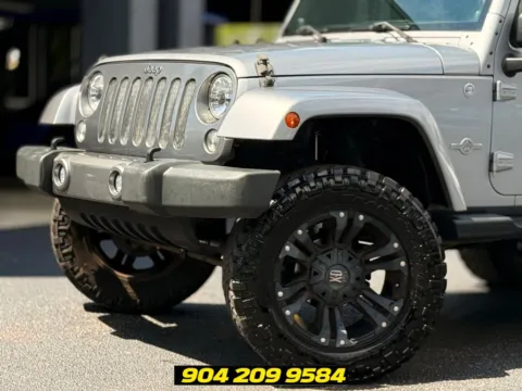 Photos of 2014 Jeep Wrangler Unlimited Freedom Edition for sale in Jacksonville, FL at AUTOLAND