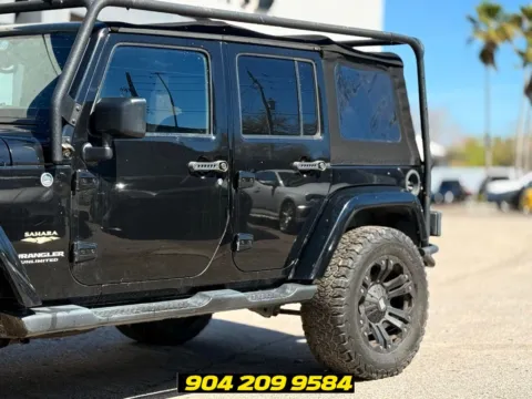 Another view of 2015 Jeep Wrangler Unlimited Sahara for sale in Jacksonville, FL at AUTOLAND
