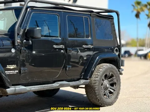 Another view of 2015 Jeep Wrangler Unlimited Sahara for sale in Jacksonville, FL at AUTOLAND