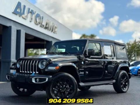 Black 2023 Jeep Wrangler Sahara 4xe for sale in Jacksonville, FL