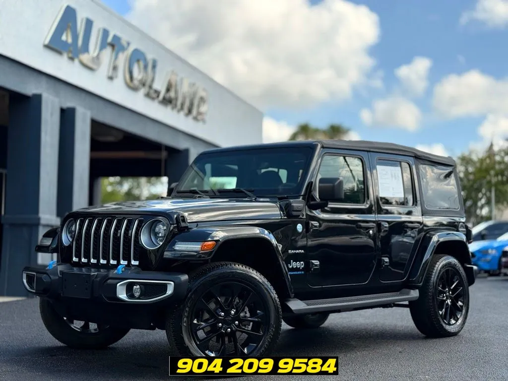 Black 2023 Jeep Wrangler Sahara 4xe for sale in Jacksonville, FL