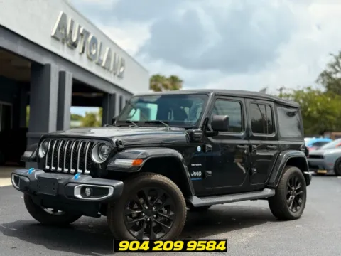Black 2023 Jeep Wrangler Sahara 4xe for sale in Jacksonville, FL
