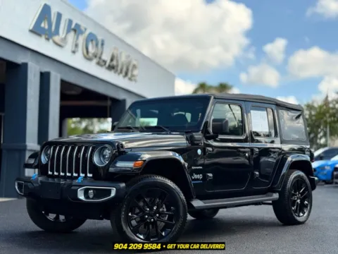 Black 2023 Jeep Wrangler Sahara 4xe for sale in Jacksonville, FL