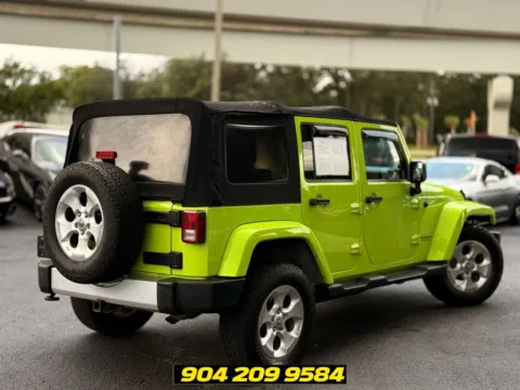 More photos of 2013 Jeep Wrangler Unlimited Sahara at AUTOLAND, FL