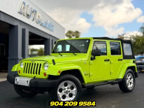 Green 2013 Jeep Wrangler Unlimited Sahara for sale in Jacksonville, FL