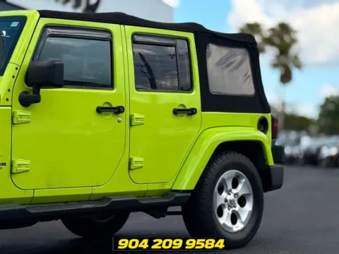 More photos of 2013 Jeep Wrangler Unlimited Sahara at AUTOLAND, FL