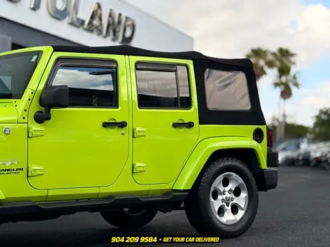 Another view of 2013 Jeep Wrangler Unlimited Sahara for sale in Jacksonville, FL at AUTOLAND