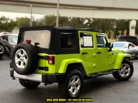 More photos of 2013 Jeep Wrangler Unlimited Sahara at AUTOLAND, FL