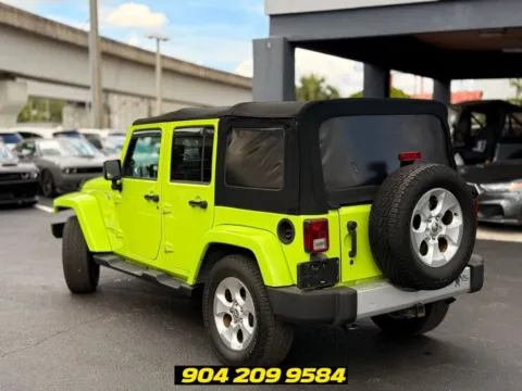 Another view of 2013 Jeep Wrangler Unlimited Sahara for sale in Jacksonville, FL at AUTOLAND