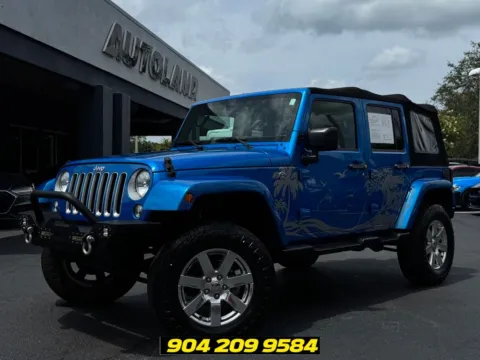 Blue 2016 Jeep Wrangler Unlimited Sahara for sale in Jacksonville, FL