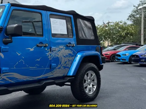 Another view of 2016 Jeep Wrangler Unlimited Sahara for sale in Jacksonville, FL at AUTOLAND