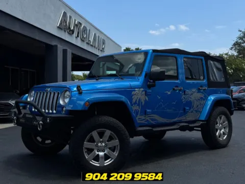 Blue 2016 Jeep Wrangler Unlimited Sahara for sale in Jacksonville, FL