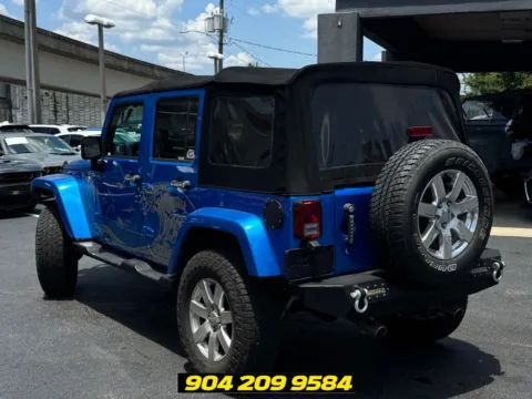 Another view of 2016 Jeep Wrangler Unlimited Sahara for sale in Jacksonville, FL at AUTOLAND