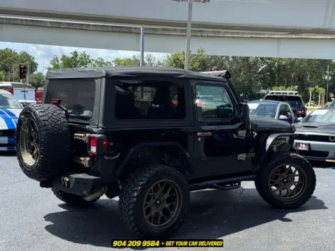 More photos of 2019 Jeep Wrangler Sport S at AUTOLAND, FL