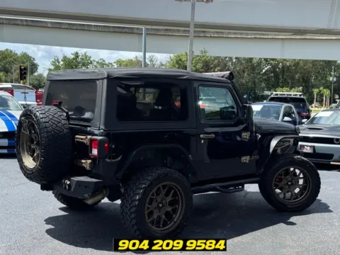 More photos of 2019 Jeep Wrangler Sport S at AUTOLAND, FL