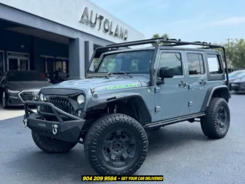 Gray 2014 Jeep Wrangler Unlimited Rubicon for sale in Jacksonville, FL