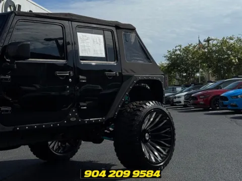 Another view of 2016 Jeep Wrangler Unlimited Sport for sale in Jacksonville, FL at AUTOLAND