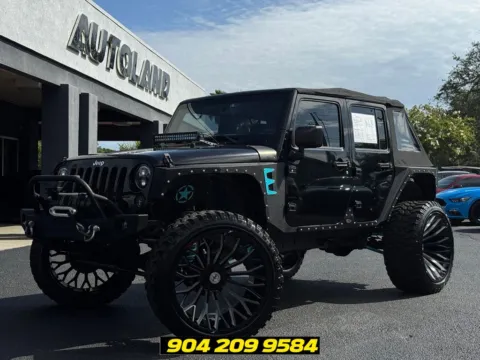 Black 2016 Jeep Wrangler Unlimited Sport for sale in Jacksonville, FL