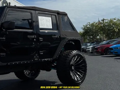 Another view of 2016 Jeep Wrangler Unlimited Sport for sale in Jacksonville, FL at AUTOLAND