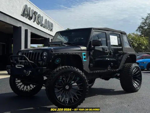 Black 2016 Jeep Wrangler Unlimited Sport for sale in Jacksonville, FL