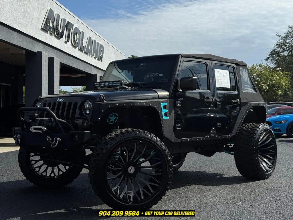 Black 2016 Jeep Wrangler Unlimited Sport for sale in Jacksonville, FL