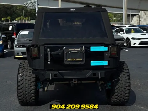 More photos of 2016 Jeep Wrangler Unlimited Sport at AUTOLAND, FL