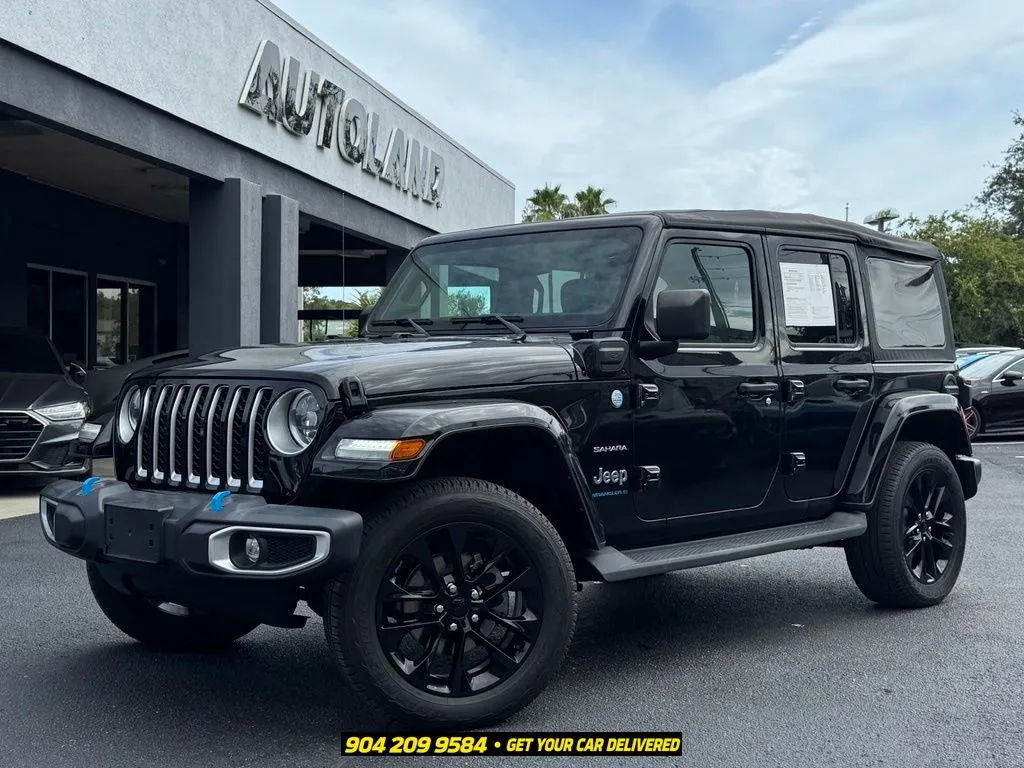 Black 2023 Jeep Wrangler Sahara 4xe for sale in Jacksonville, FL