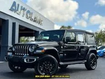 Black 2023 Jeep Wrangler Sahara 4xe for sale in Jacksonville, FL