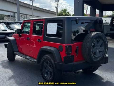More photos of 2015 Jeep Wrangler Unlimited Sport at AUTOLAND, FL