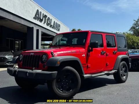Red 2015 Jeep Wrangler Unlimited Sport for sale in Jacksonville, FL